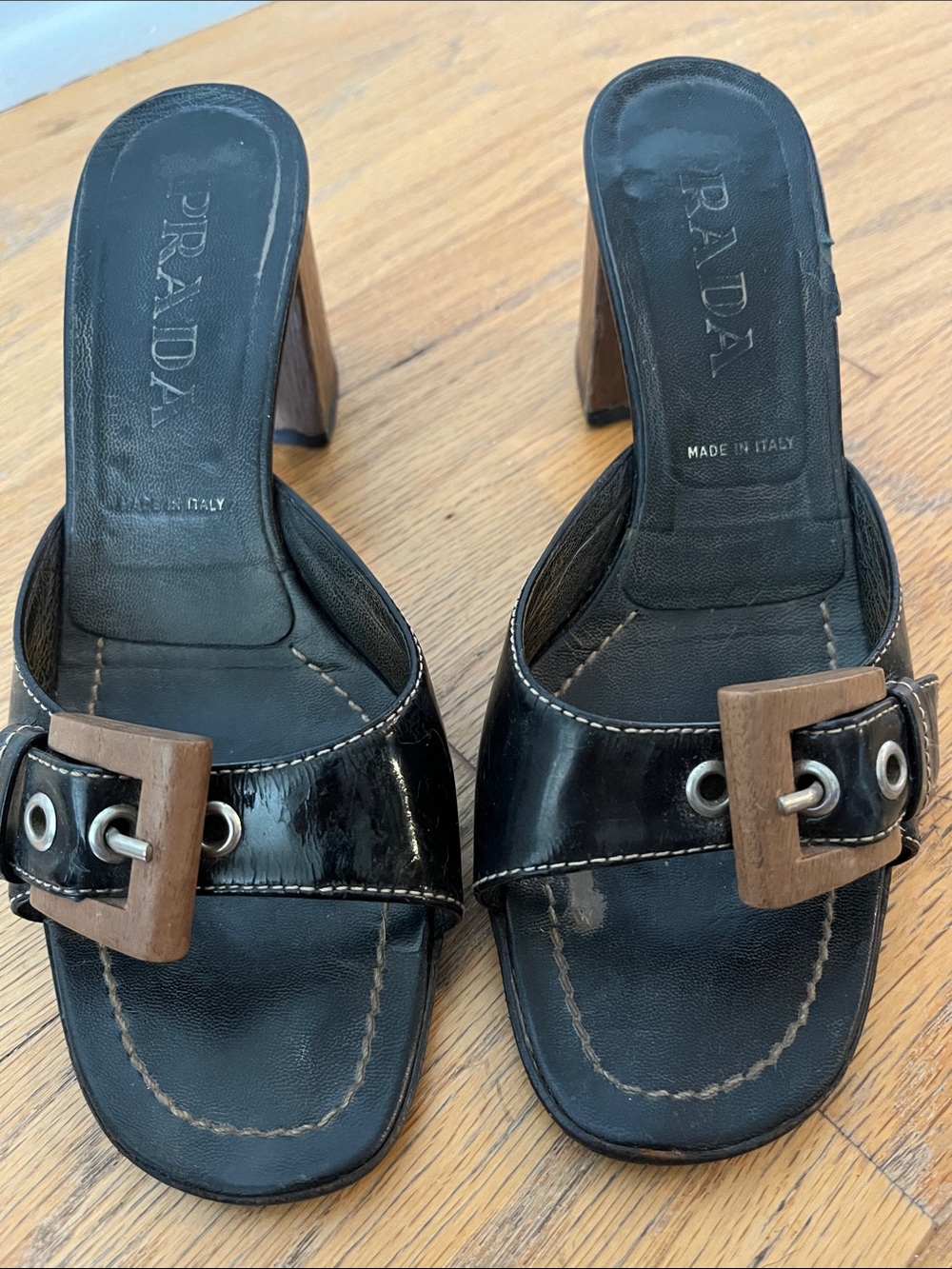 Prada Black Patent Leather Mules with Wood Buckle